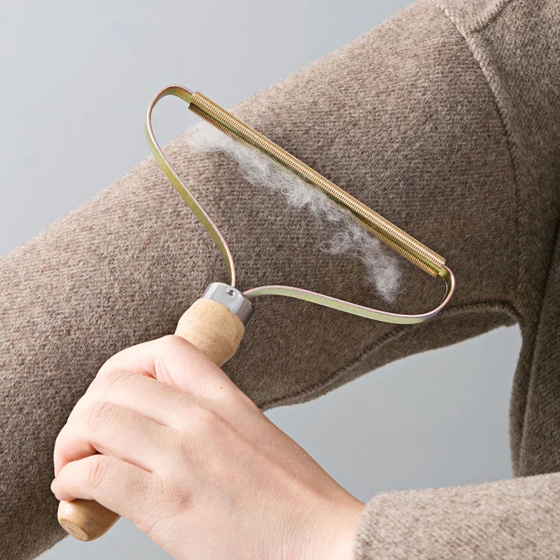 Brosse anti-poils pour animaux de compagnie