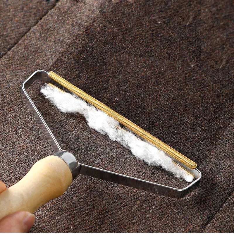 Brosse anti-poils pour animaux de compagnie